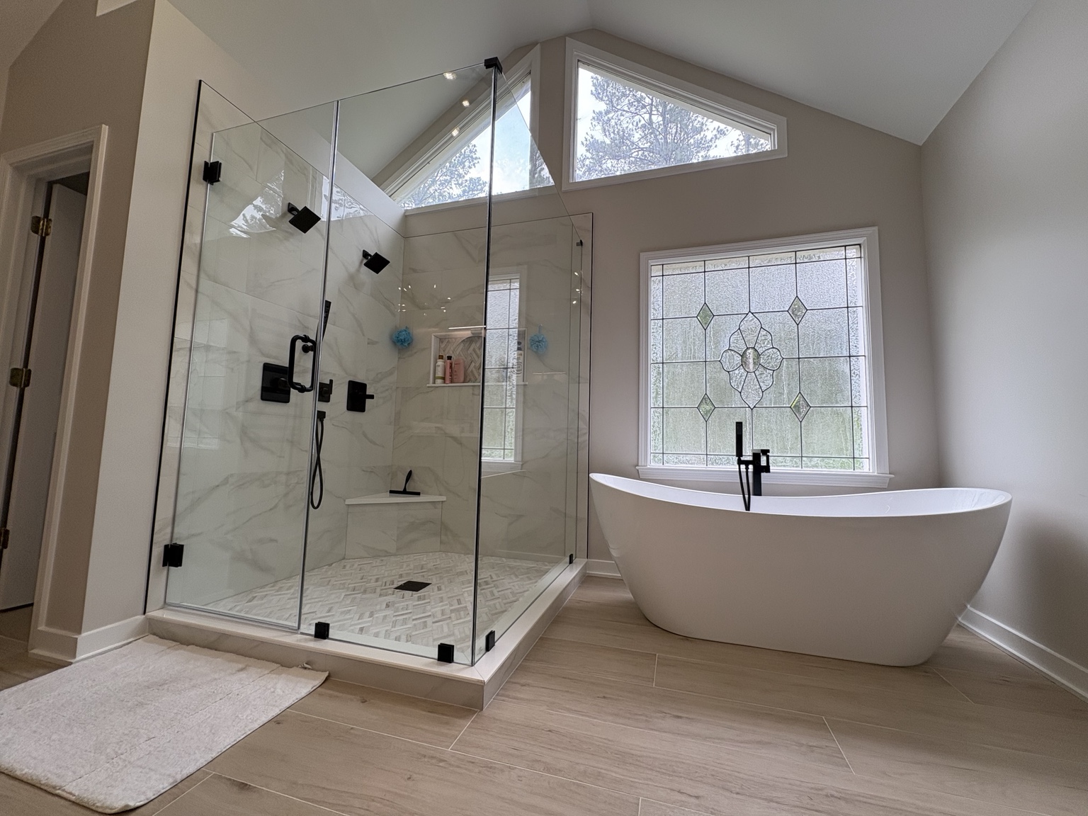 Vaulted spa bathroom completed by Wave Renovation